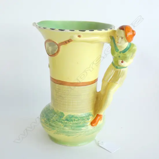 A Burleighware jug with tennis player handle